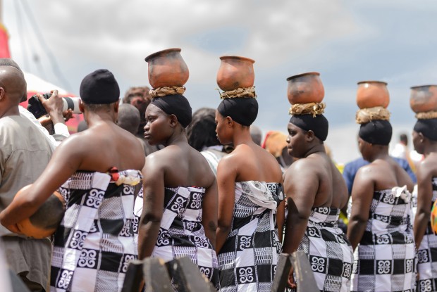 Women carrying boiling pots on their heads at the 75th Anniversary of Nana Ofori Atta