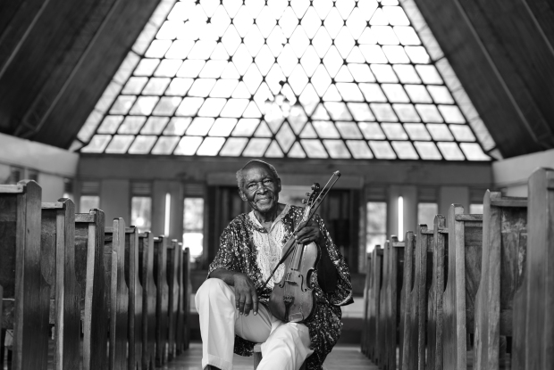 Christopher Brown Nambago lived a life of hard work and adventure. He was the first black traffic Police officer in the colonial era, goalkeeper of the national team and at the same time, a member of the national cricket team. He was also a fine musician. At 94, when he died, he had been playing the same violin for 76 years. In 1938, while studying at Busoga College Mwiri, Nambago ordered the violin from Lenard’s Company in Britain, through his teacher, Rev. F.G. Coates.Till death,  he had kept the same violin. ©Jjumba Martin 2016