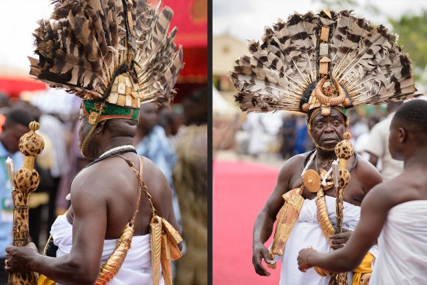 The Ashanti Royal Sword bearer from Ghana wears an eagle-feathered headdress featuring golden ram horns at The The 75th Anniversary of Nana Ofori Atta.  His role is to protect the King at all ceremonies, warding off evil and absorbing any physical threats to his master. His ritual regalia is believed to protect not only souls of the Royal court, but the entire Ashanti Nation.  &copy; Jjumba Martin 2018