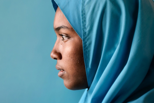 A portrait of Lula, student at Morneau Shepell Secondary School for Girls (MSSSG) in Kakuma refugee camp, nothern Kenya. The school enrolls studious, hardworking girls while also helping the most vulnerable girls in the camp. Girls who are orphaned or only have one parent, or those who lack family support and protection, are at a disadvantage. They have no means of earning money and they risk being pulled from school to care for siblings, do tasks such as collect firewood, or get married. If they go to MSSSG they can stay in school, be safe, and focus on their education. Taken on assignment for the GAS. Company. (2015)