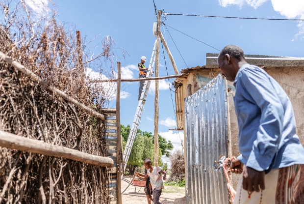 May 9th, 2024- Sheder Refugee Camp, Ethiopia. A HumEn technician makes a new house connection in Sheder refugee Camp, northeastern Fafan Zone in the Somali region of Ethiopia. The Ethiopia Petroleum and Energy Authority (PEA) granted the country's first commercial mini-grid license under its new mini-grid directive to Humanitarian Energy (HumEn), an Ethiopian private limited company founded by Mercy Corps, Rensys Engineering and Trading company to provide sustainable energy as a service to refugee and host communities, as well as humanitarian agencies in Ethiopia. The license allows HumEn to deploy and commercially operate a 253 kW solar PV mini-grid to service the refugee and host communities of Sheder town. Ethiopia is home to an estimated 4.7 million forcibly displaced persons, yet only 7% of these people have access to energy. HumEn is committed to finding new ideas and ways to work together to provide clean, long-lasting energy services in the Somali region of Ethiopia and across the country.
