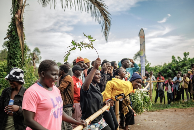 A Cheering audience at a fight - Soft ground wrestling Uganda