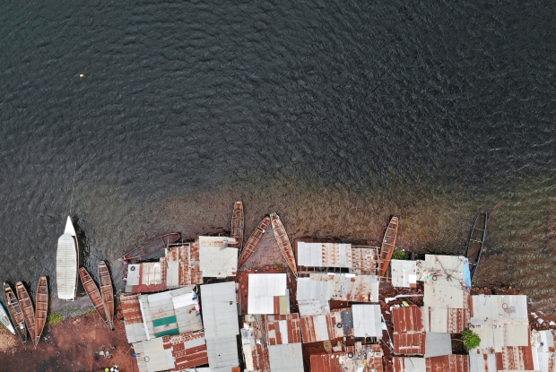 Lake Victoria supports one of the largest freshwater fisheries in the world. Here in Jinja, Uganda is an example of the numerous informal settlements that surround the lake. Pollution around such fishing villages is on the increase and more settlements around the lake are registered. &copy; Jjumba Martin, 2018