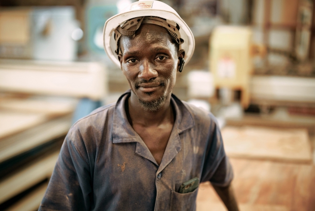 A wood worker at Mayondo Engineering works, Uganda 2024.