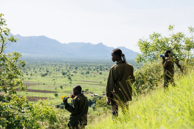 Community Wildlife Scouts of Orom Conservancy. These men, are usually sourced from the community, and they use bangs and vuvuzelas to scare away elephants from entering their gardens. They also warn communities about their invasions. The initiative is under Umoja Wildlife Conservancies, a non-profit working to strengthen community participation in managing wildlife outside protected areas by developing strong community structures towards conservation and demonstrating tangible benefits of wildlife to these neighboring communities and landowners. By promoting a community-based human-wildlife conflict mitigation approach, Umoja empowers communities to address the conflicts on their own, thus encouraging coexistence between people and wildlife amidst escalating human-wildlife conflict as visible all over the world. &copy; Jjumba Martin, Umoja Wildlife Conservancies 2023