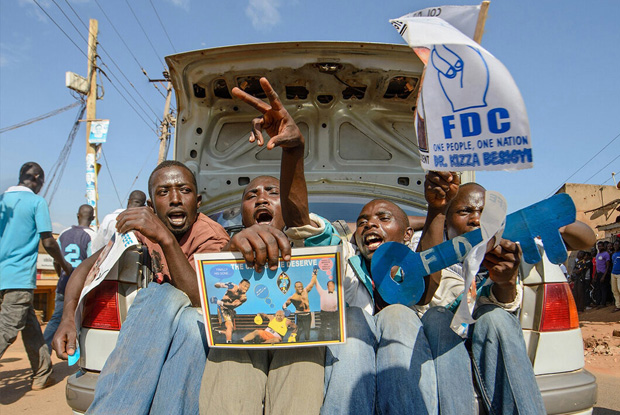 2016, Kampala Uganda. Supporters of Forum for Democratic Change (FDC) Presidential aspirant Kizza Besigye Kifeefe campaigning in Kireka, Kampala. The results of these presidential elections came with no surprise, as incumbent Yoweri Museveni secured his fifth victory with more than 60% of the votes. Besigye came second with 35%, results that sparked controversy among international observers and opposition supporters questioning the legitimacy of Museveni&rsquo;s victory. Election observers condemned the lack of transparency of the Electoral Commission and criticized the campaign of intimidation against the opposition.