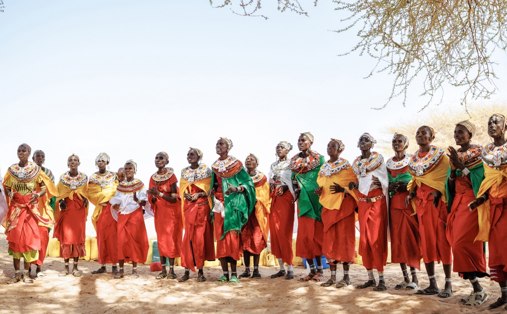 The Rendille women dress in colorful clothing, beaded necklaces and wraps, which are a form of adornment and cultural expression. The traditional attire reflects a nomadic pastoral lifestyle and is tied to various rites of passage and coming-of-age rituals.