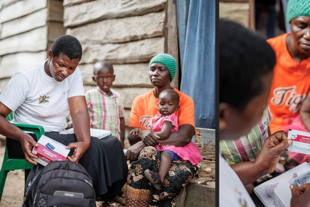 Judith engages with a mother during a home visit in Kalangala Islands, Uganda.  Kalangala District faces a significant malaria burden because of the abundance of mosquito breeding sites. Community Health Workers use malaria rapid diagnostic test kits to diagnose and treat malaria in communities like this, where access to formal healthcare is limited.