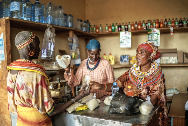 In the past, the Government of Kenya utilized cash transfers to support vulnerable groups, but it is moving towards more sustainable programs by enhancing access to economic opportunities for extremely poor households, Korr, in Marsabit being one of them. With partners, the government seeks to increase household access to skills, productive inputs, assets, finance, and economic opportunities, ensuring long-term social and economic inclusion for vulnerable communities. Galmisan, together with two friends, Galoro and Natodowa have set up a shop in the trading centre. The initiative was under the Kuza Jamii Project, where the group was mentored on business skills. Together, they took a loan from their savings group to start the retail shop business, and in a short while, their group was able to repay the money.
