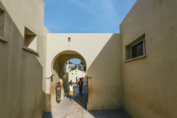 Sand-colored exterior housing units at SOS Children&rsquo;s Village Tadjourah, Djibouti, reflecting traditional desert architecture.
