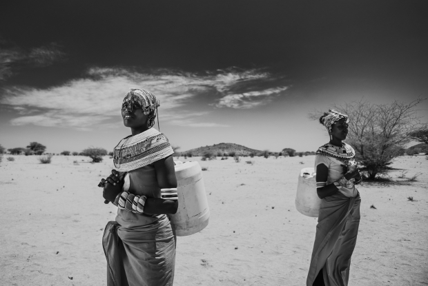 March 24, 2025 Korr, in the Marsabit county of Kenya - Like in many other desert areas, water scarcity is a severe issue among the Rendille, impacting the community's well-being and daily lives. This makes it difficult to sustain agriculture, leading to challenges in securing enough food and increasing the burden on women and girls who must travel long distances to find water.  The community relies heavily on artesian wells. The way they roll jerrycans on the ground is quite a scene. - &copy; Jjumba Martin 2025.